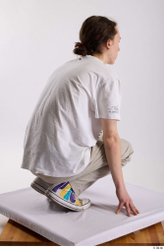 Man White Casual Shirt Jeans Slim Kneeling Studio photo references